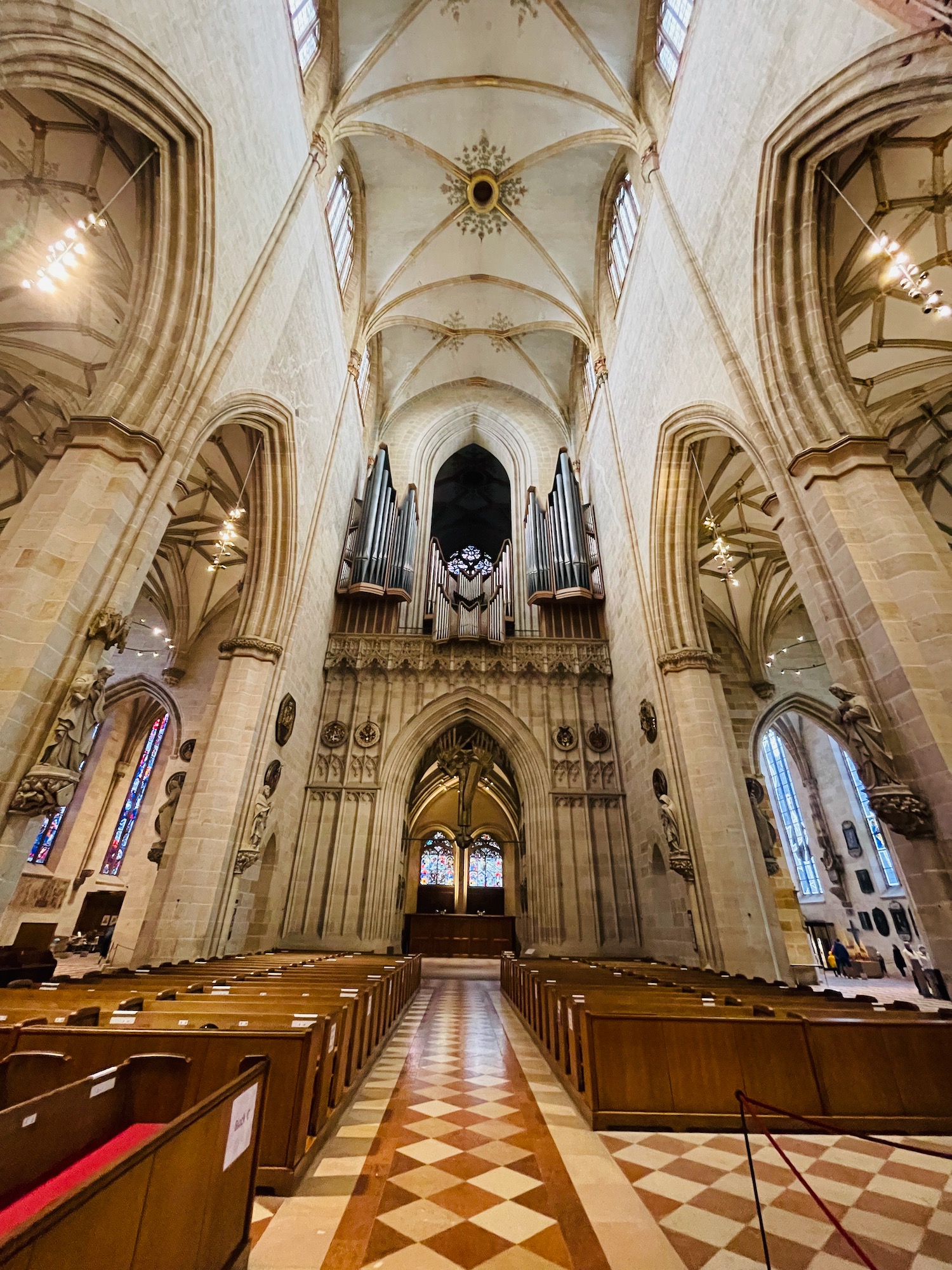 a church with many pews and columns