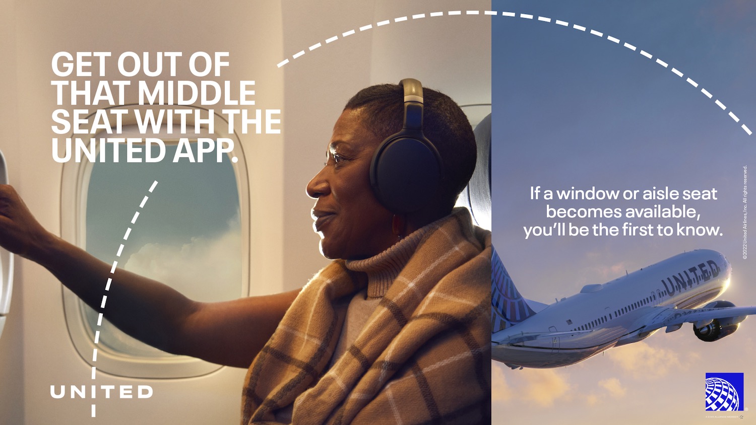 a woman wearing headphones and a blanket on a plane