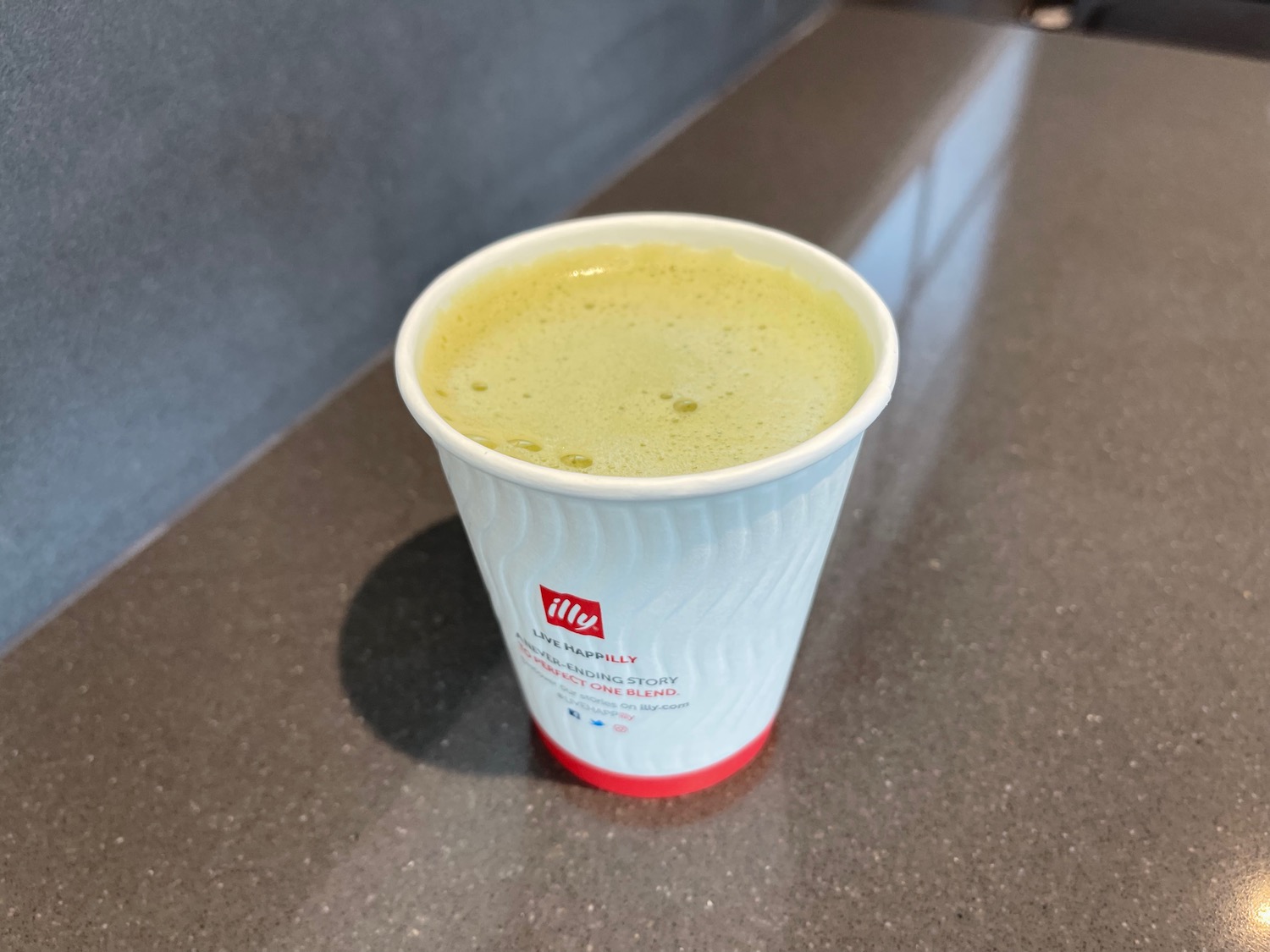 a cup of green liquid