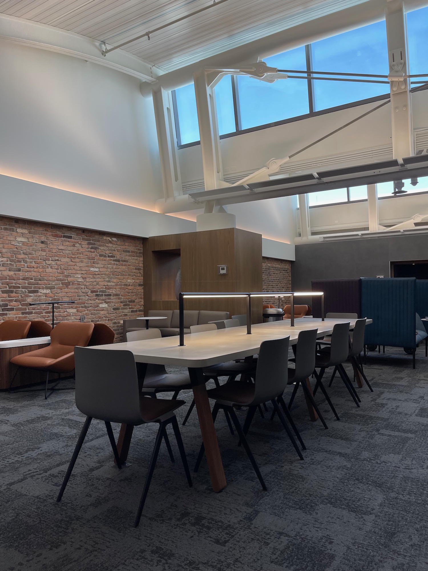 a room with a large table and chairs