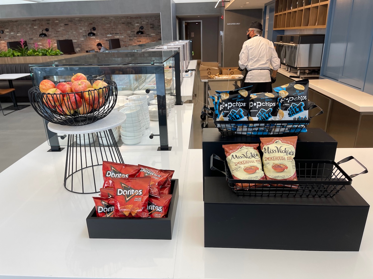 a counter with food in baskets