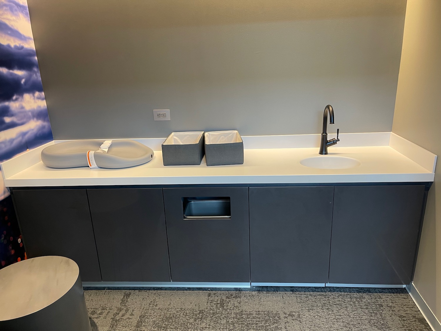 a sink and faucet in a room