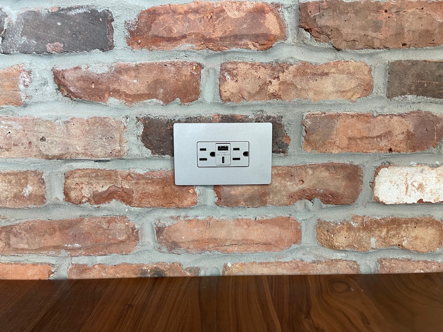 a wall with a power outlet