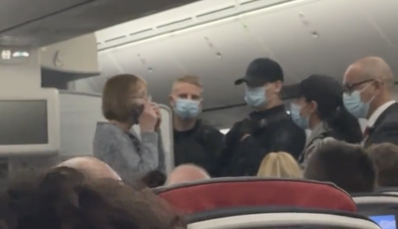 a group of people wearing face masks