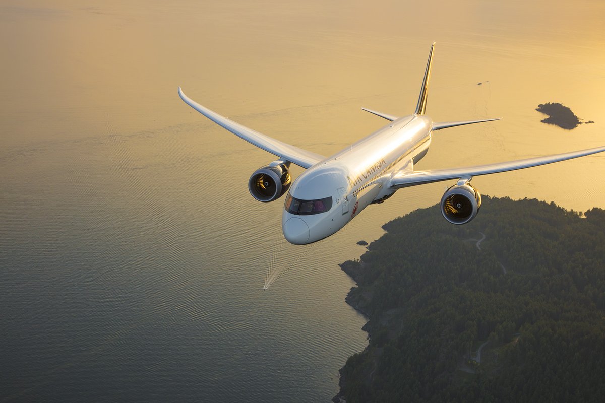 an airplane flying over water