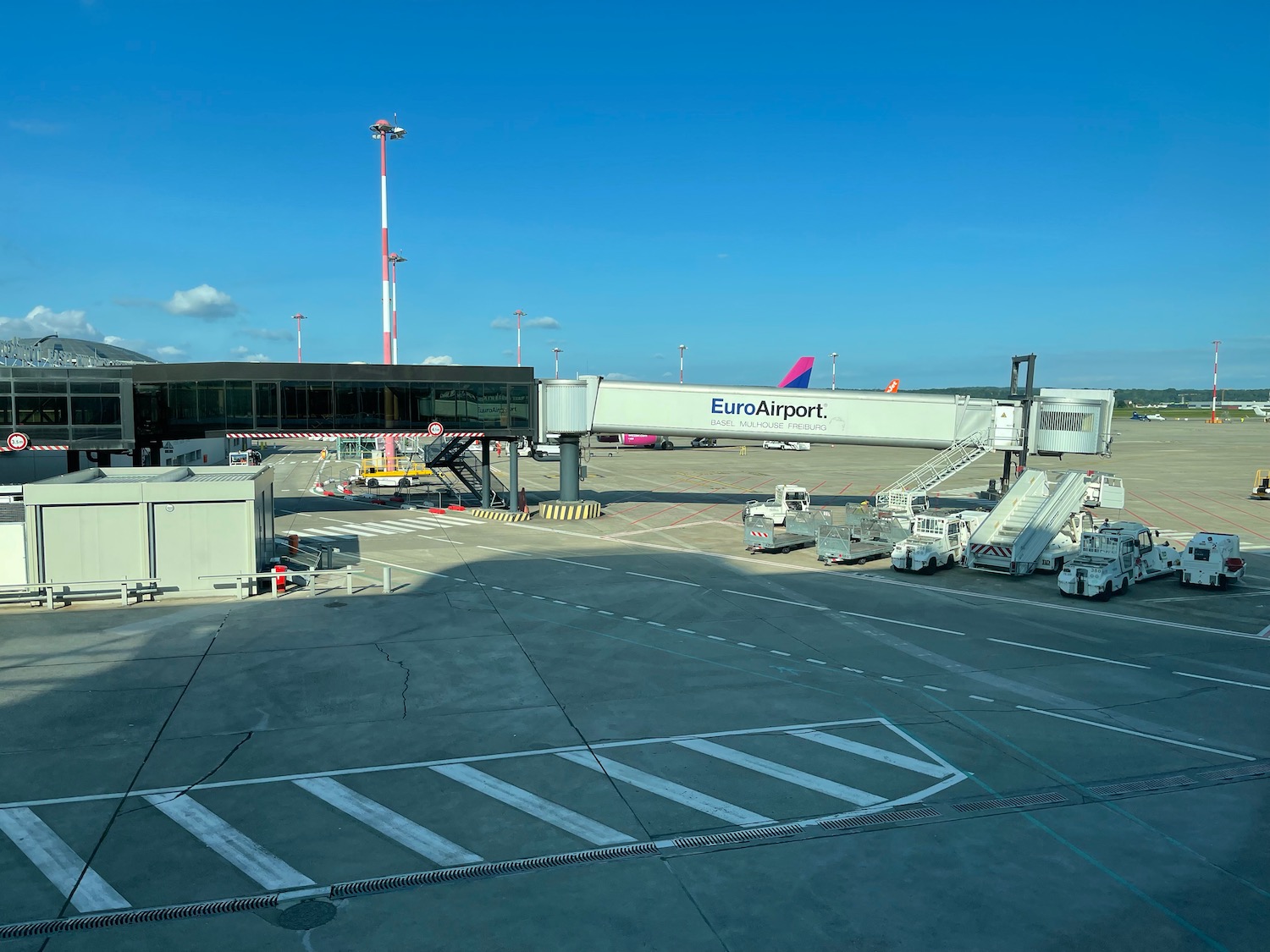 a plane boarding area with stairs and stairs