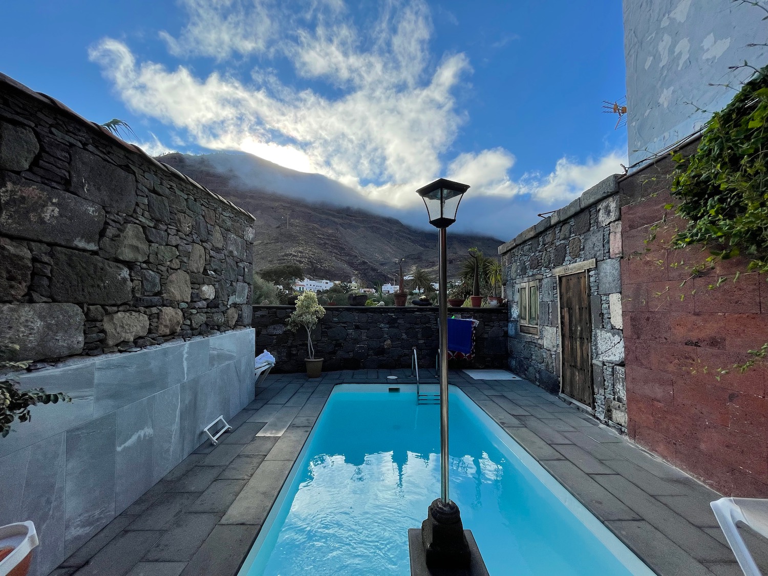 a pool with a pole in the middle of it