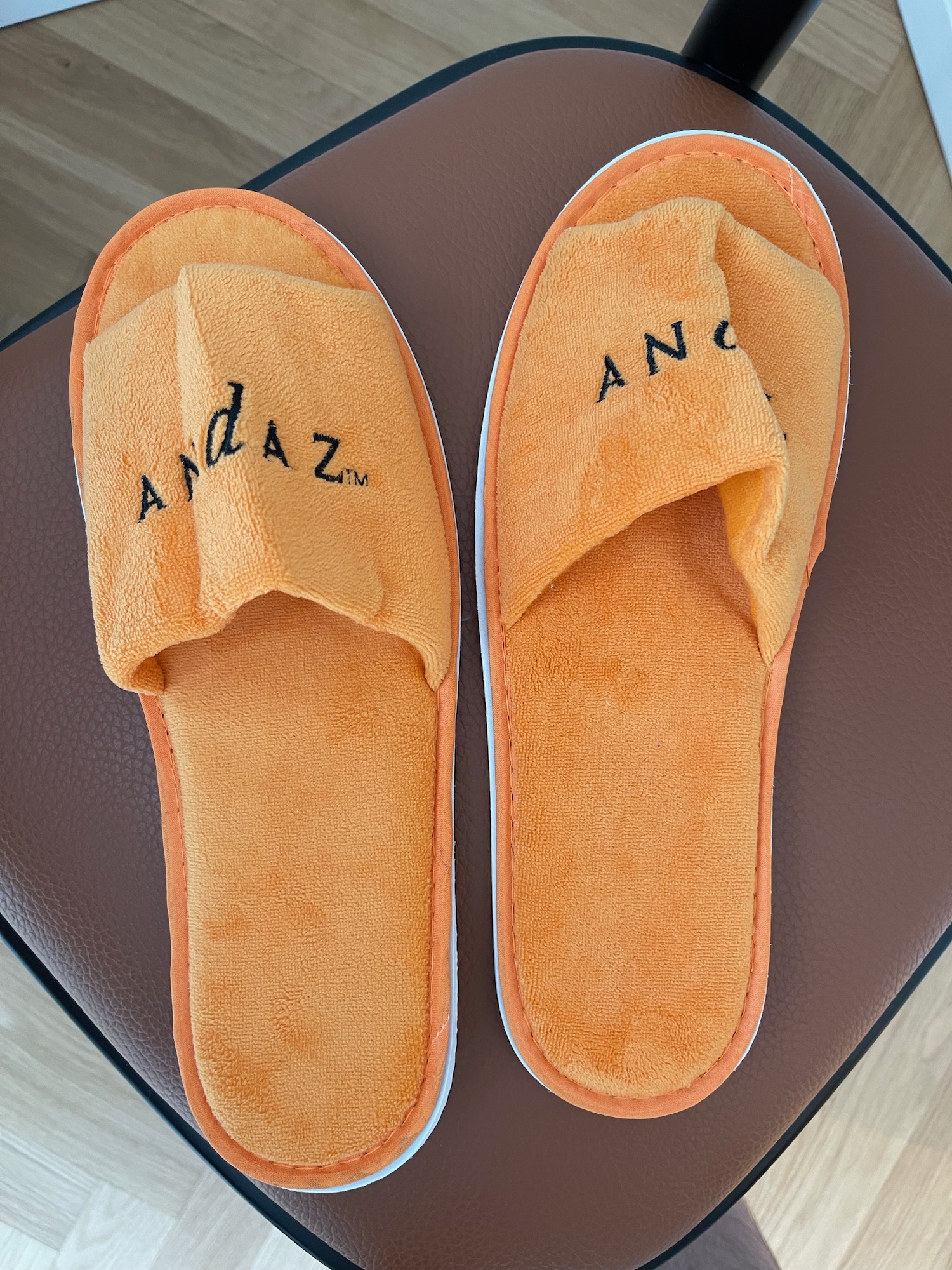 a pair of orange slippers