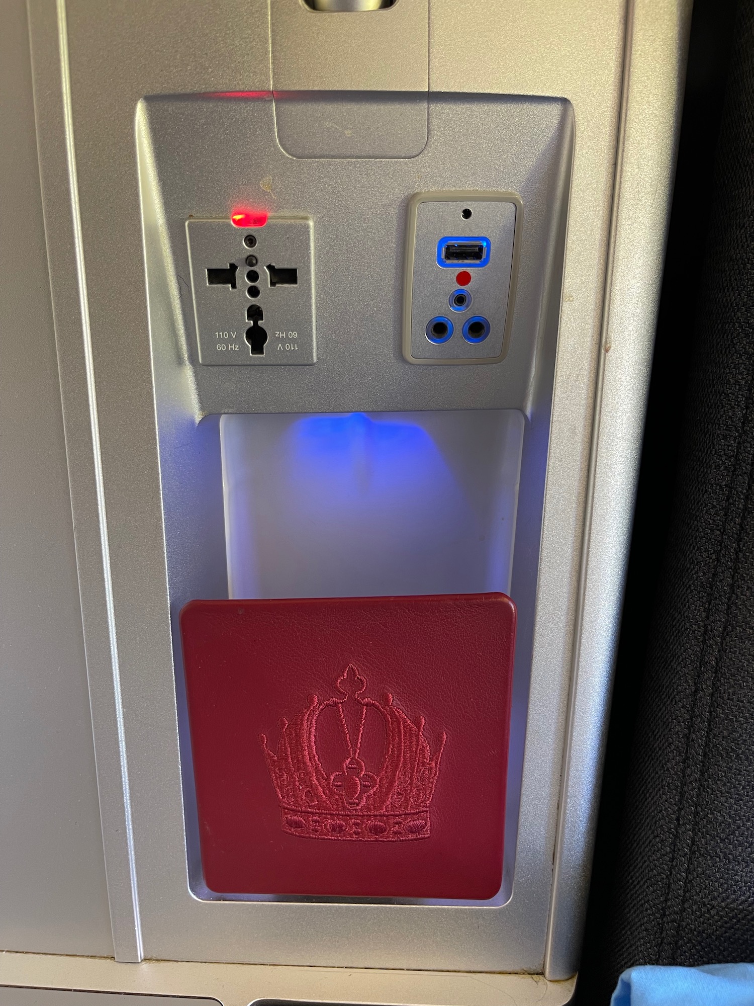 a passport and plugs in a machine