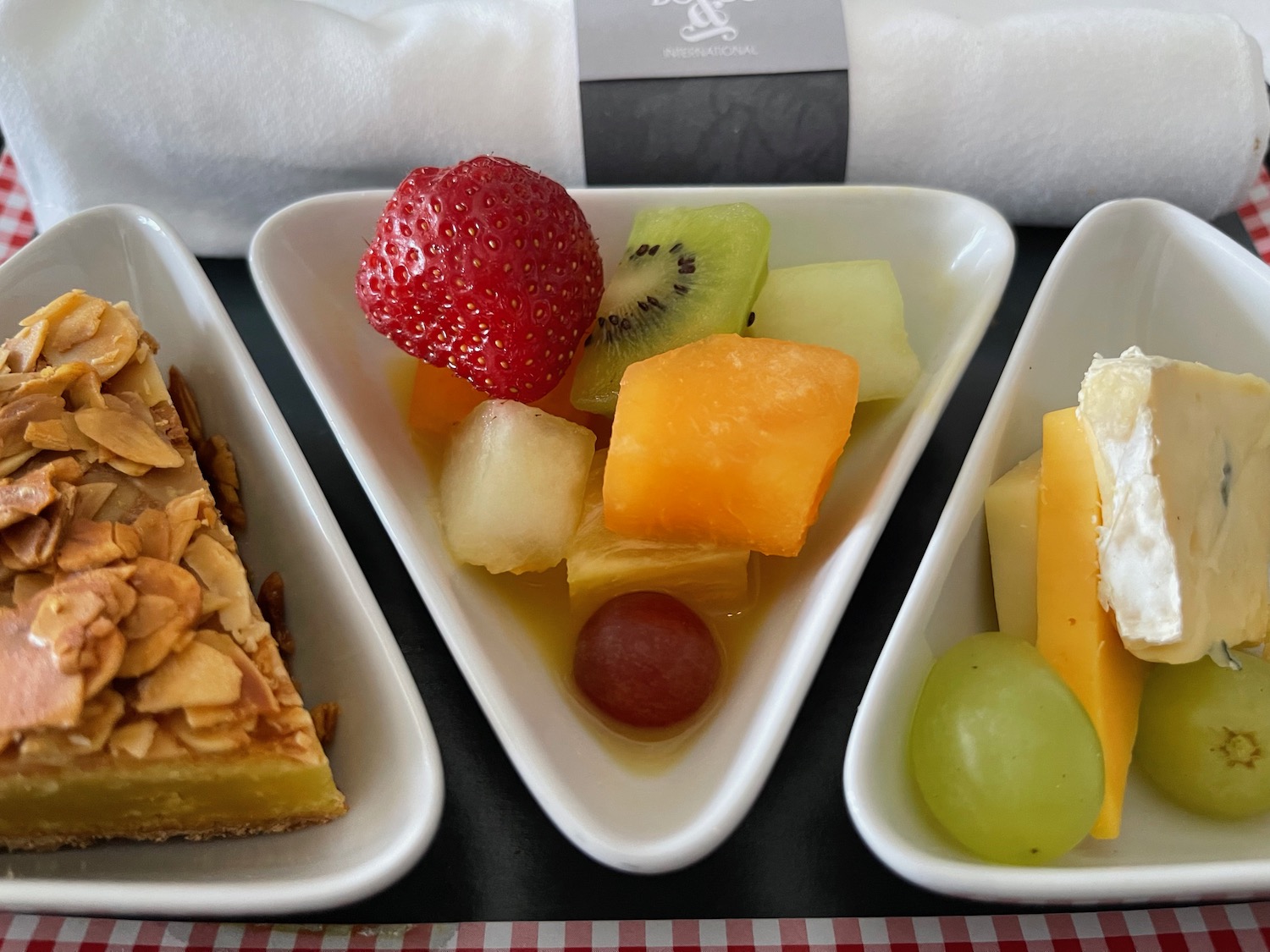 a group of plates of fruit