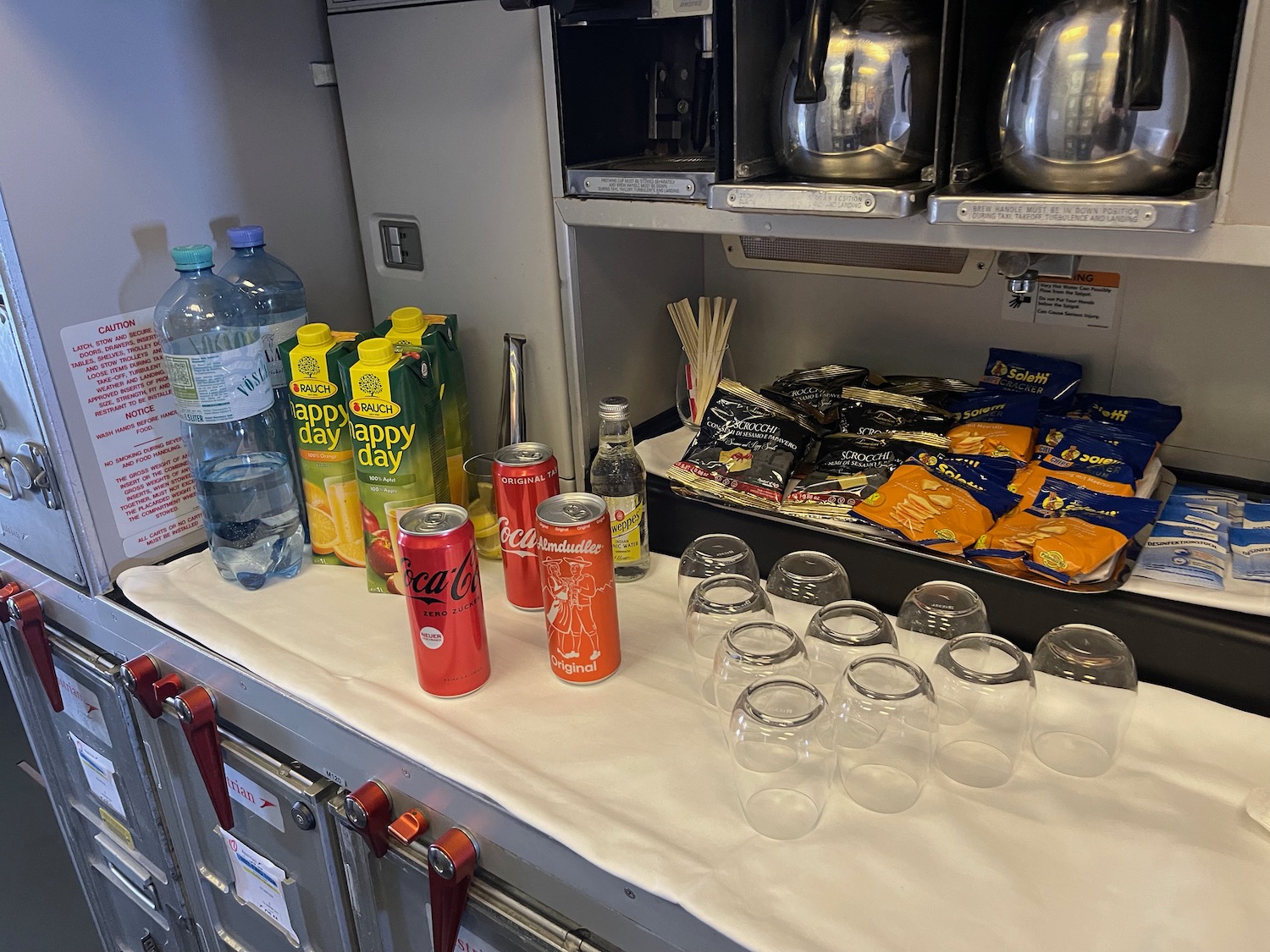 a table with drinks and glasses on it