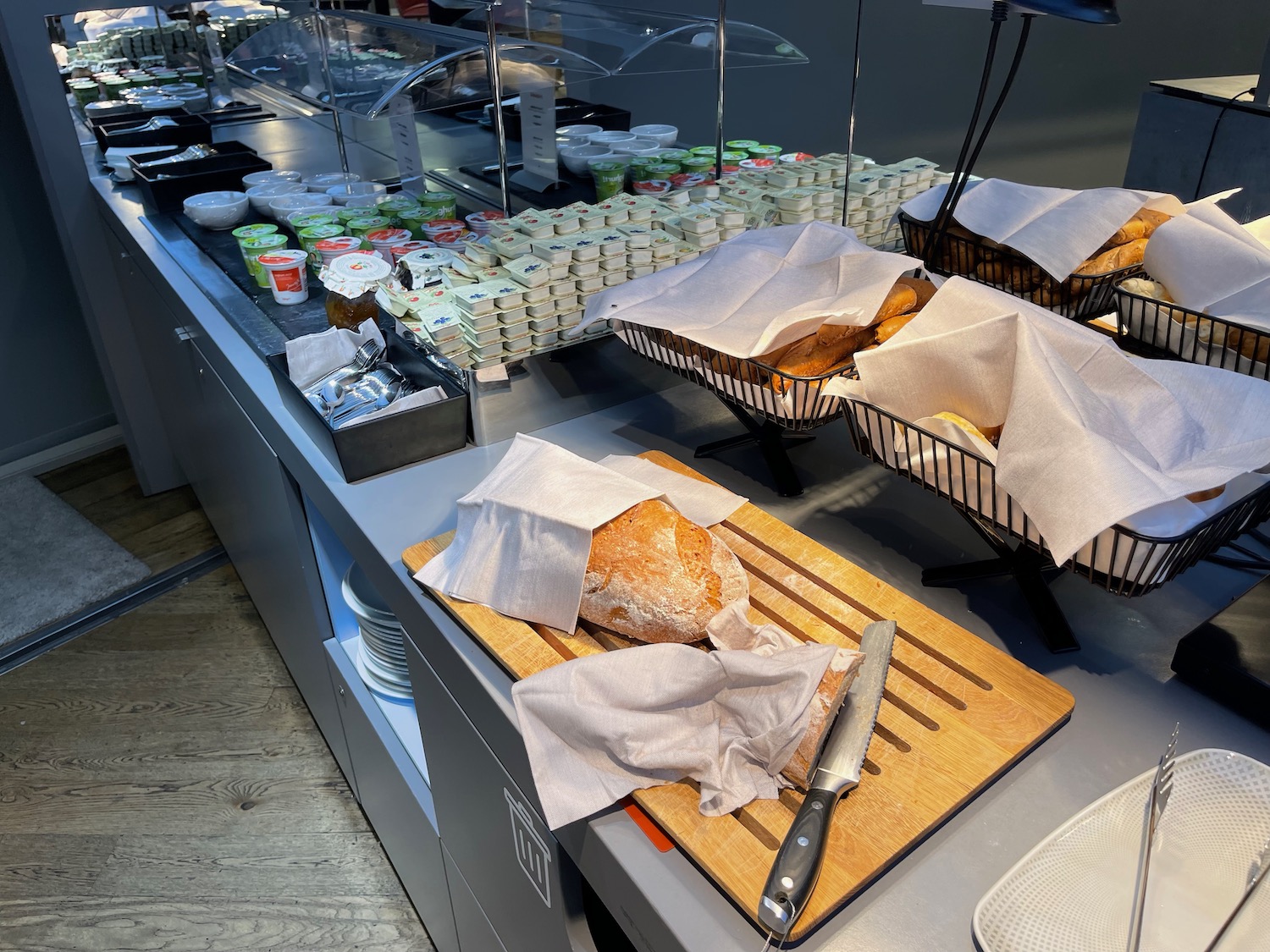 a counter with bread and knives