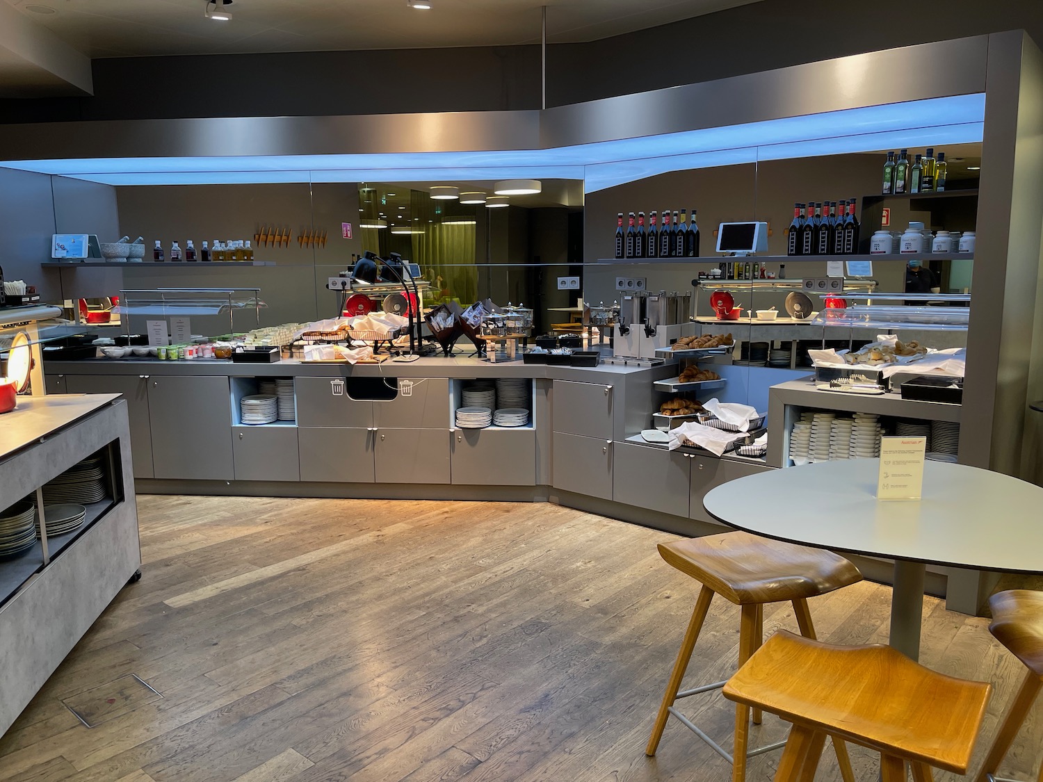 a restaurant with a counter and a table