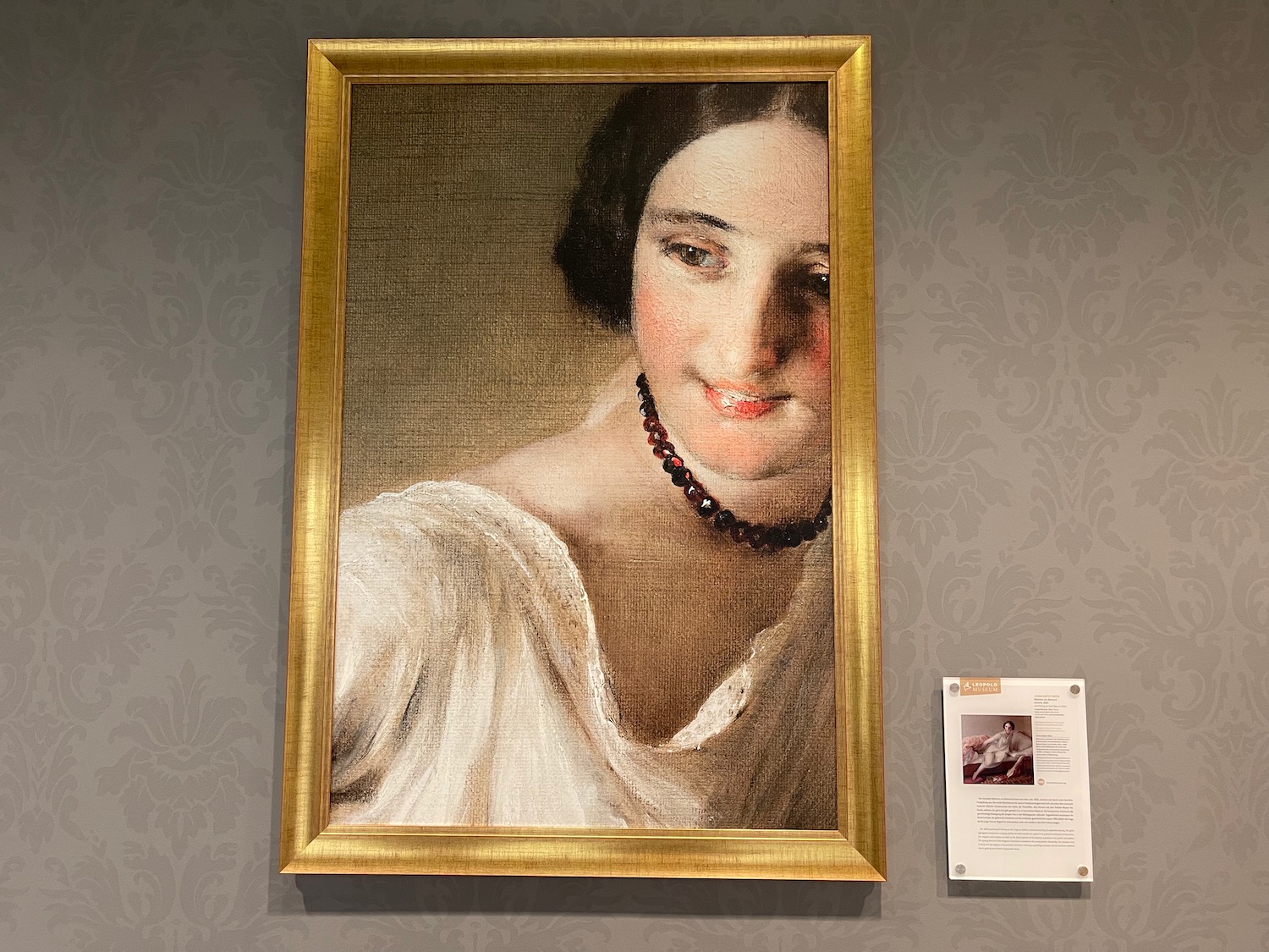 a framed picture of a woman