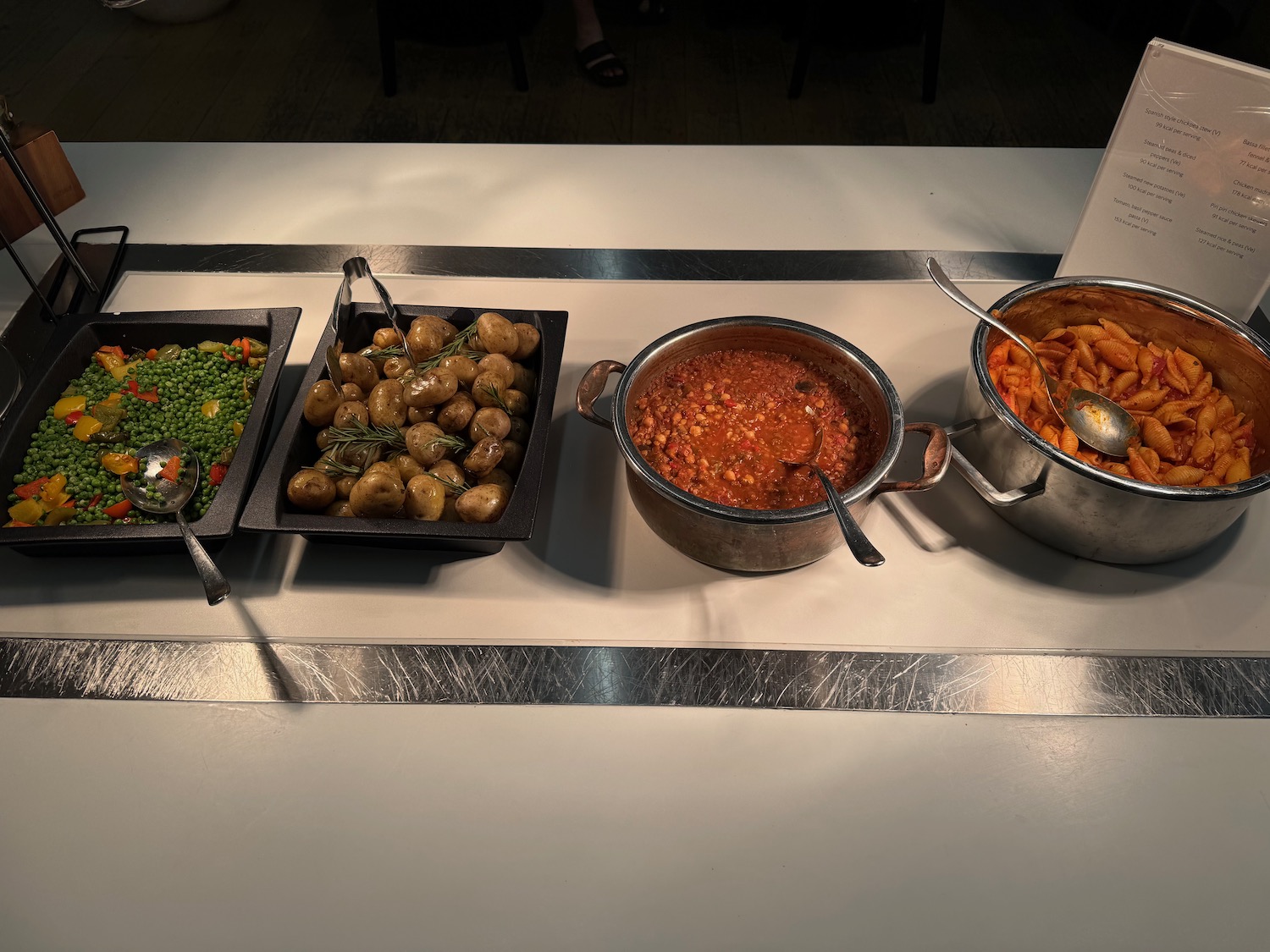 a row of bowls of food