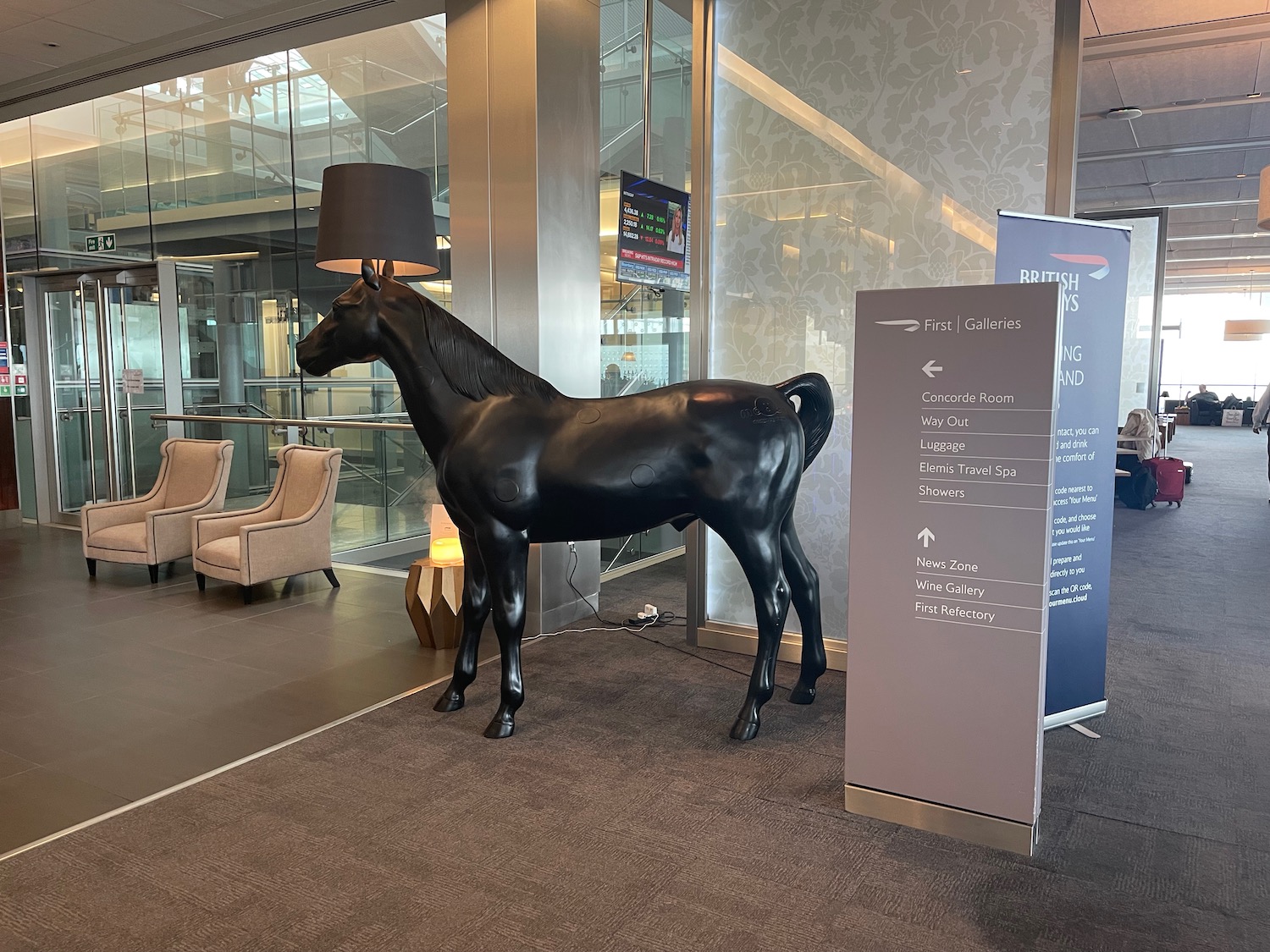 a statue of a horse with a lamp shade