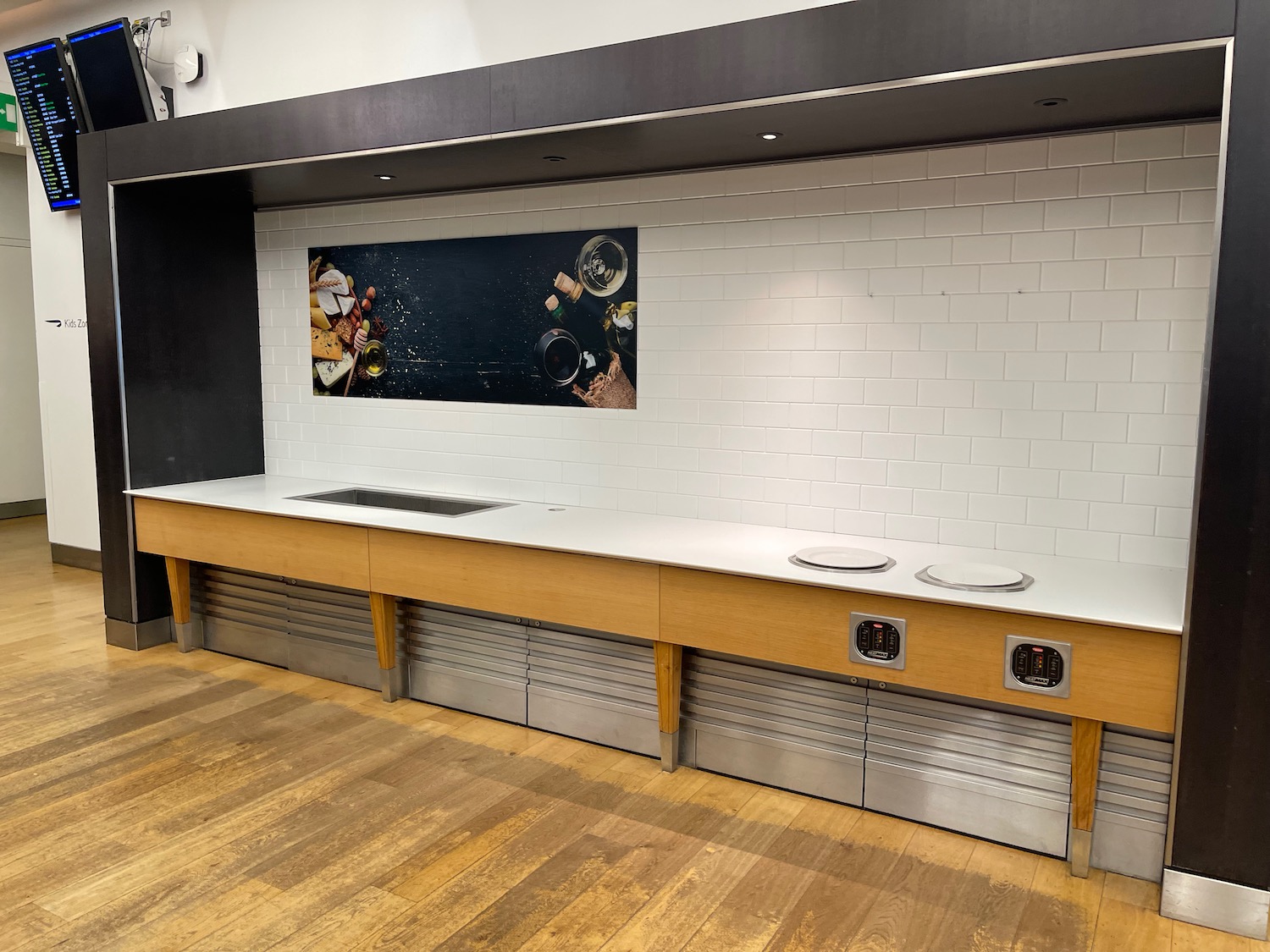 a kitchen counter with a wood floor and a wood floor