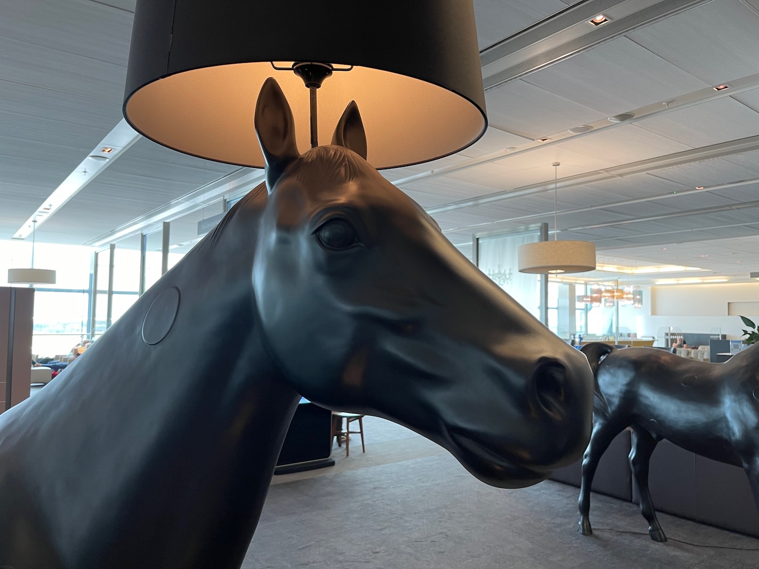 a horse head lamp in a room