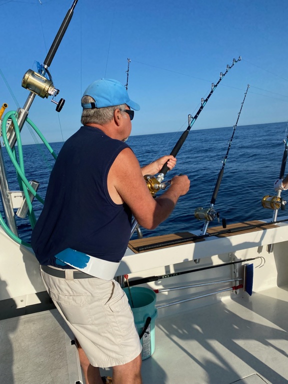 Deep sea fishing little shell catching a massive fish