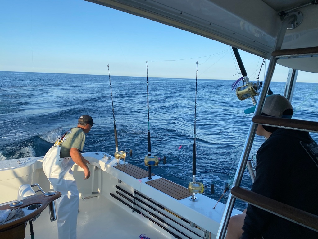 Deep sea fishing little shell lines in water