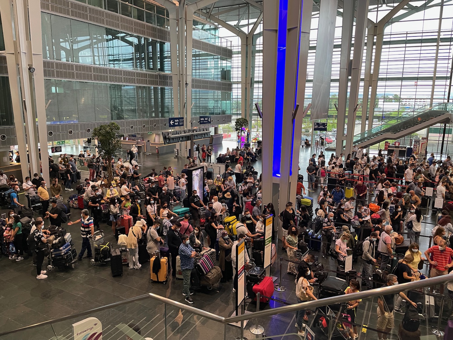 a large group of people in a large building