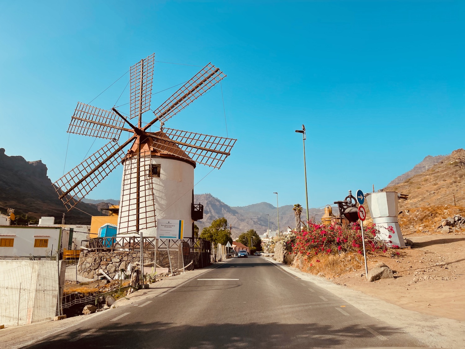 a windmill on a road