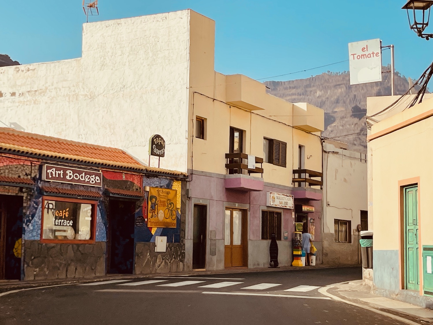 a street with buildings and signs