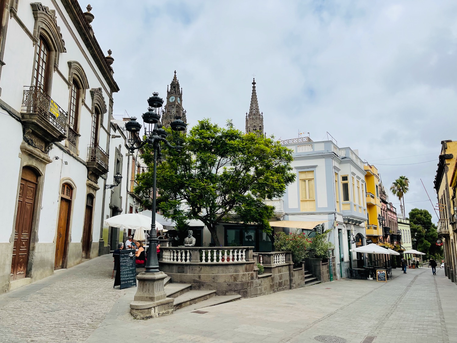 a street with buildings and trees