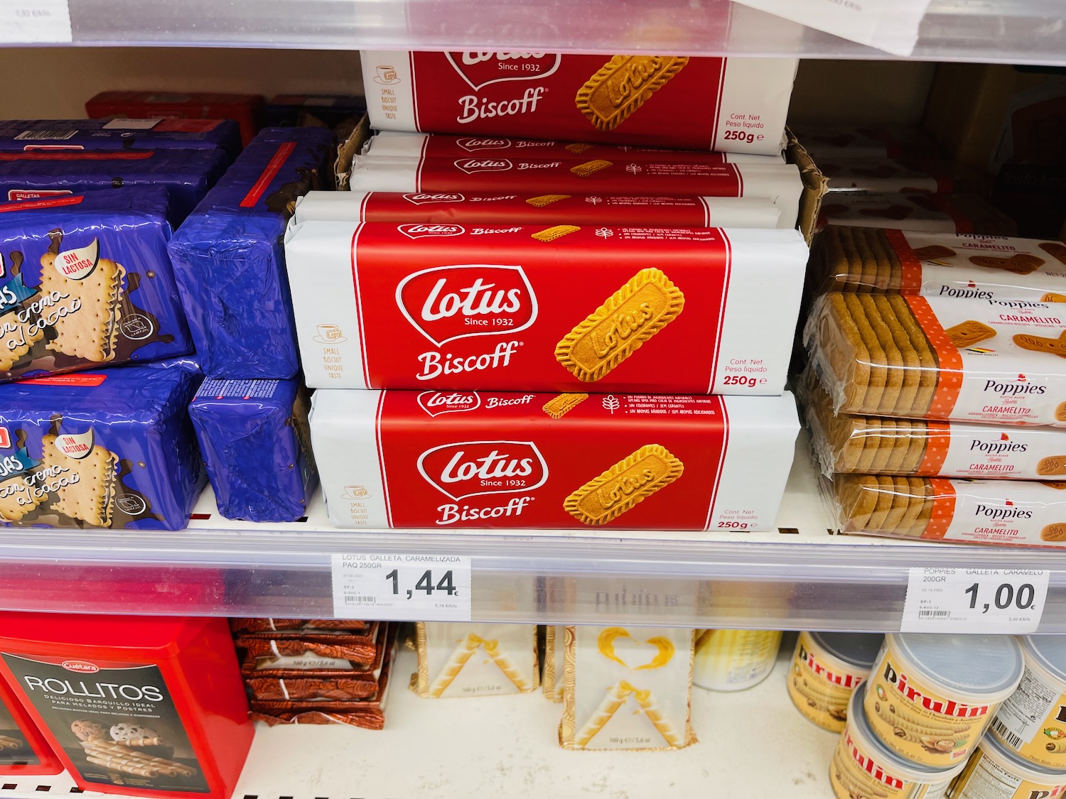 a shelf with packages of cookies