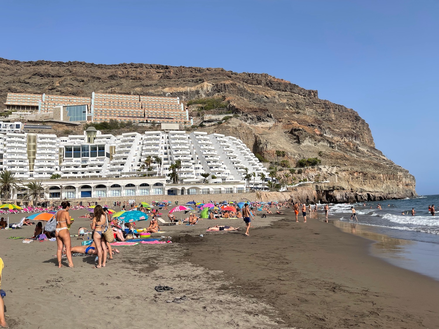 a group of people on a beach