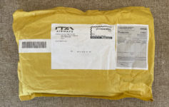 a yellow package with a white label