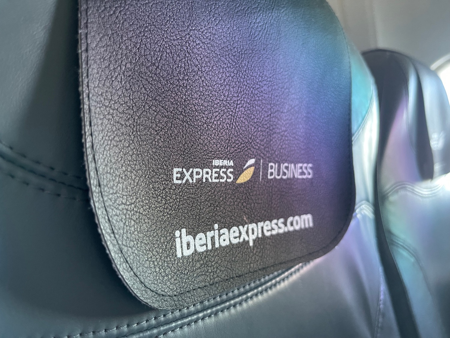 a close up of a black leather seat