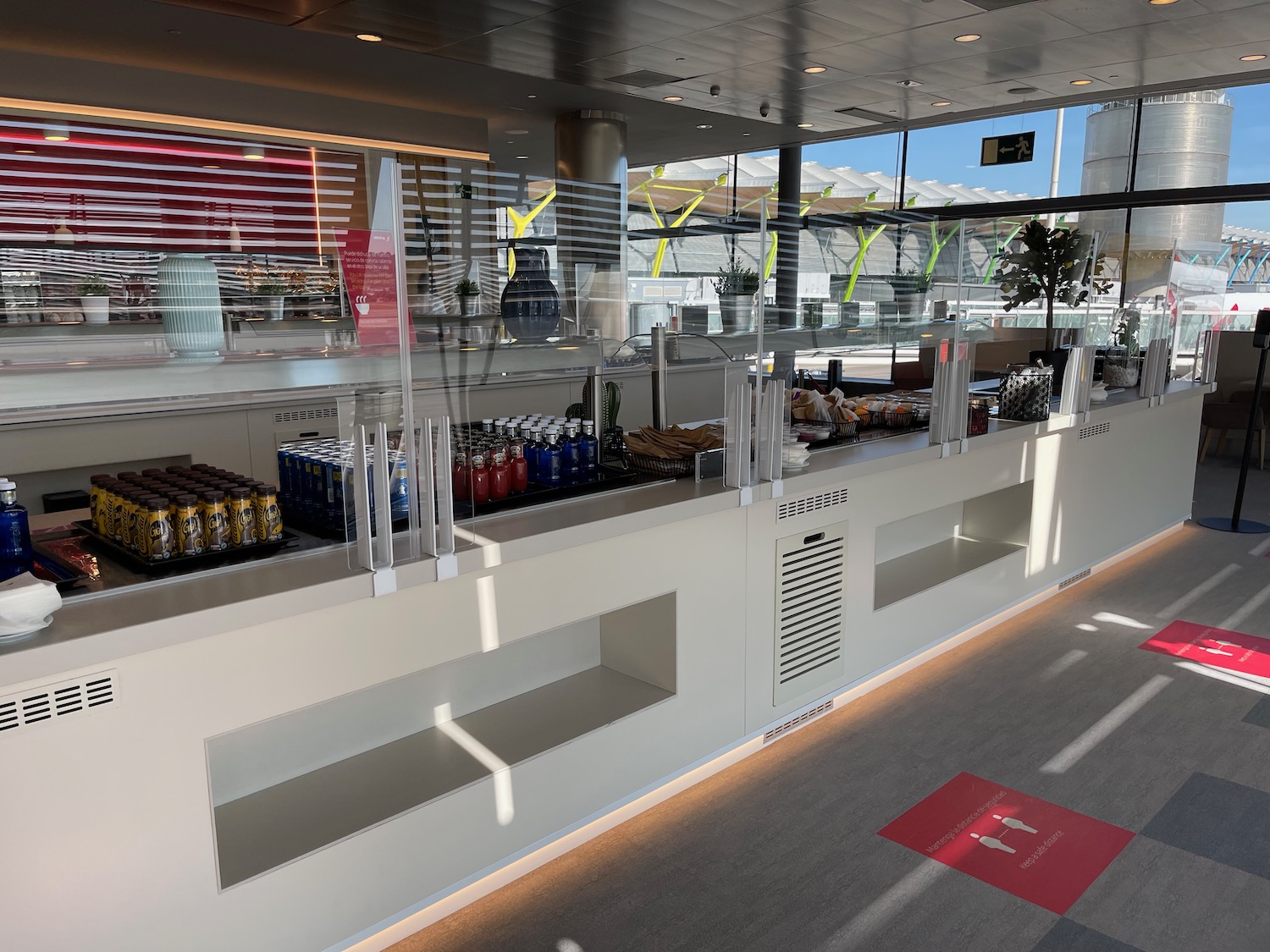 a white counter with drinks on it