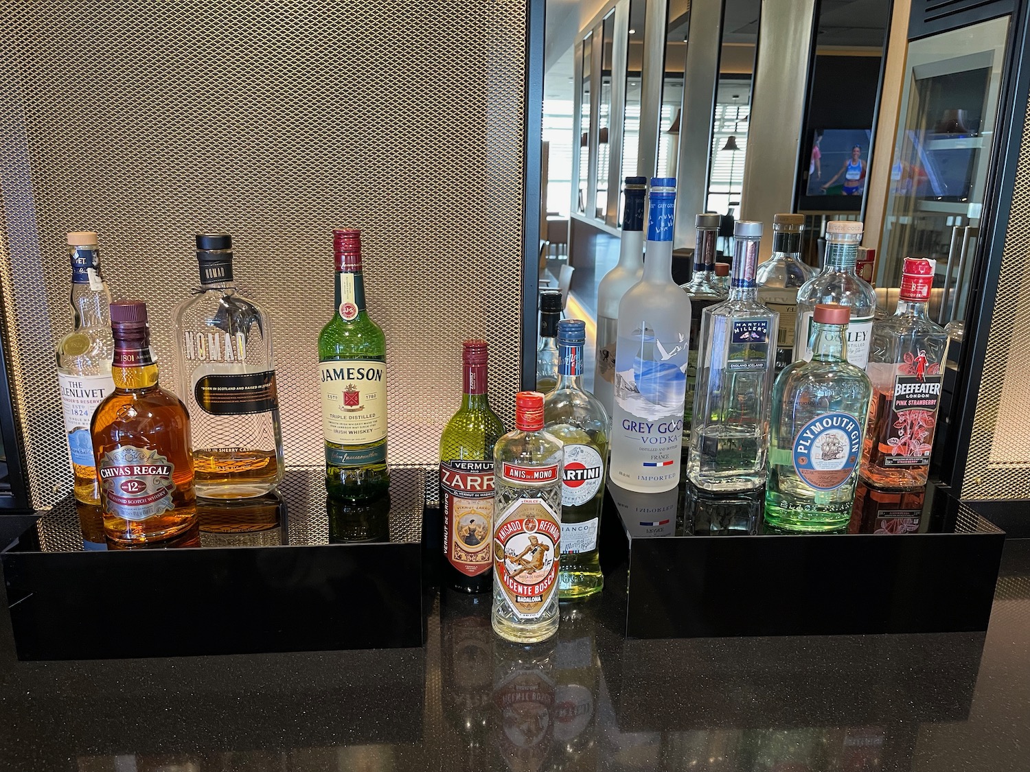 a group of bottles of alcohol on a counter