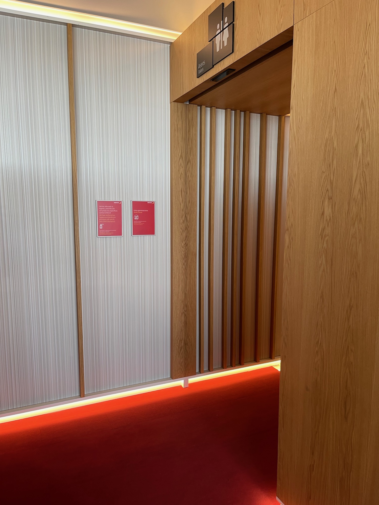 a elevator with a red sign