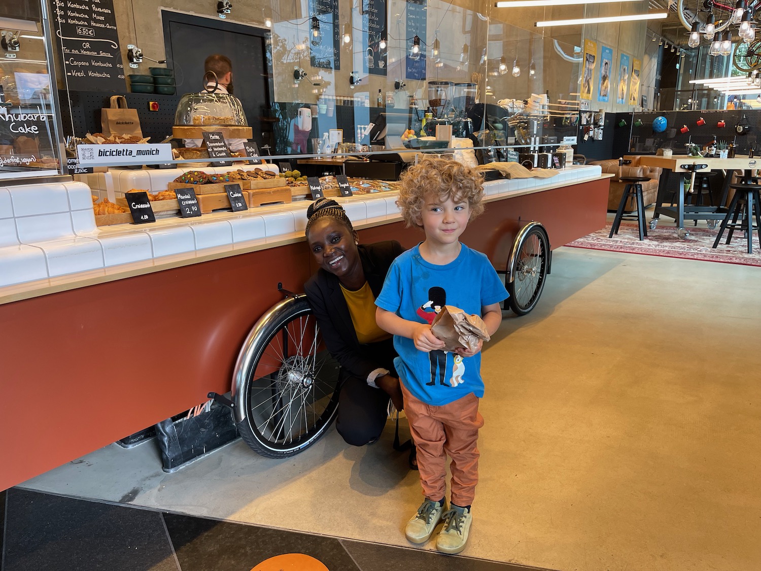 a woman and boy posing for a picture