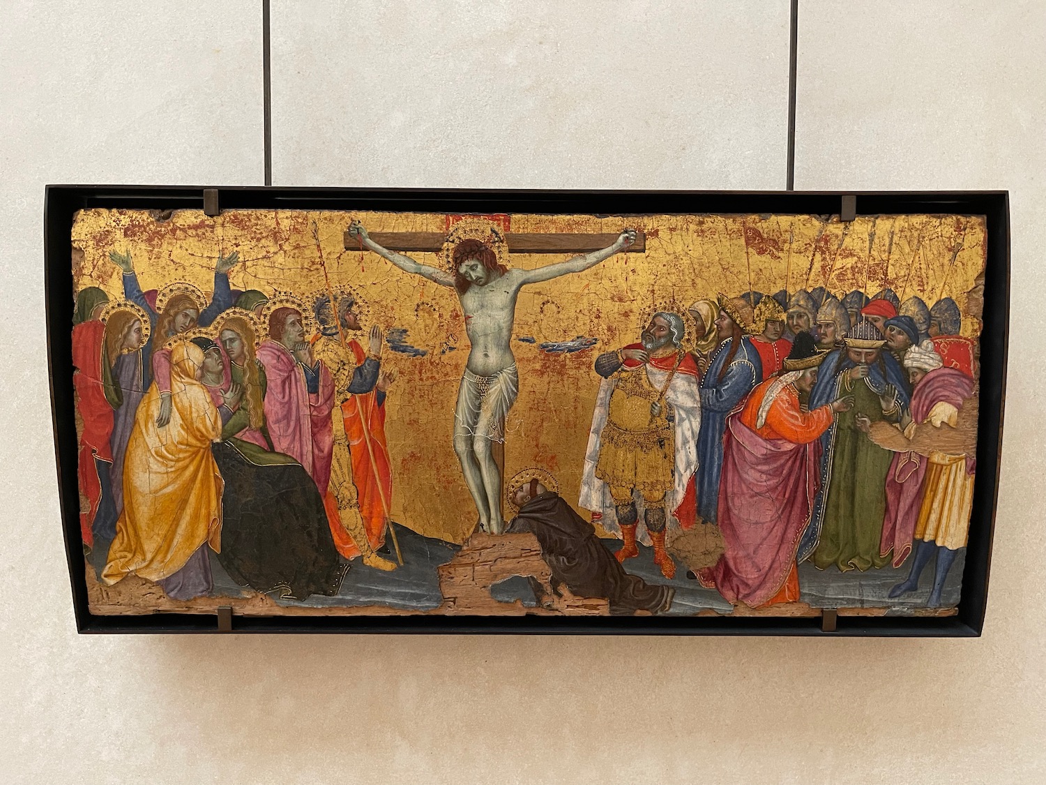 a painting of a crucifixion on a wall