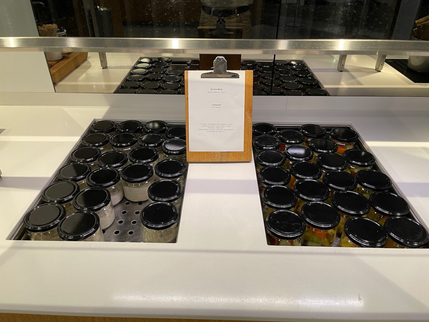 jars in a counter with a clipboard