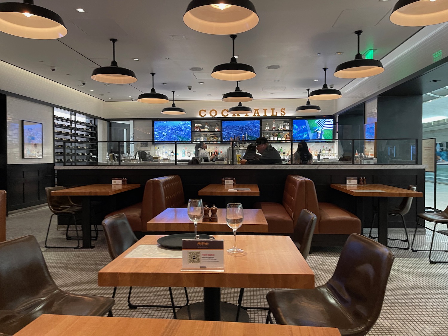 a restaurant with tables and chairs