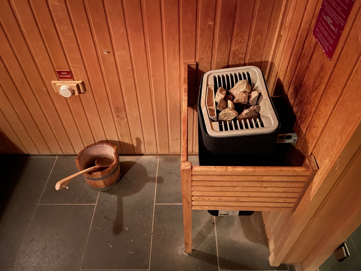 a wood bucket and a wood stove