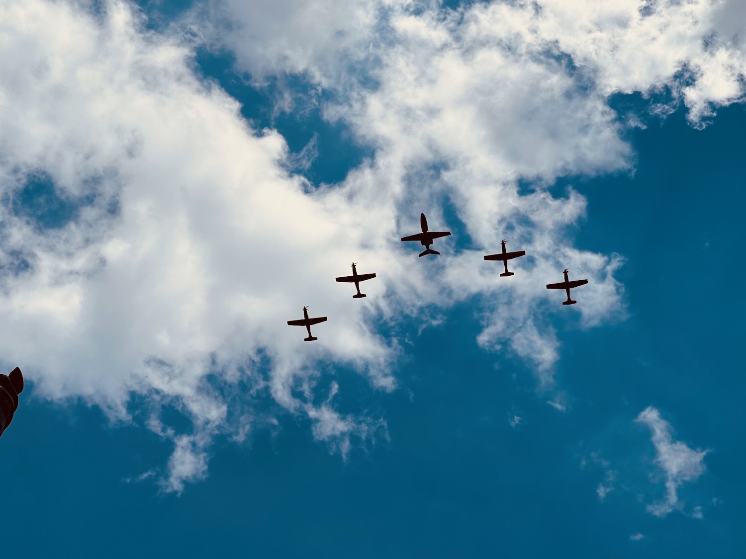 a group of airplanes flying in the sky