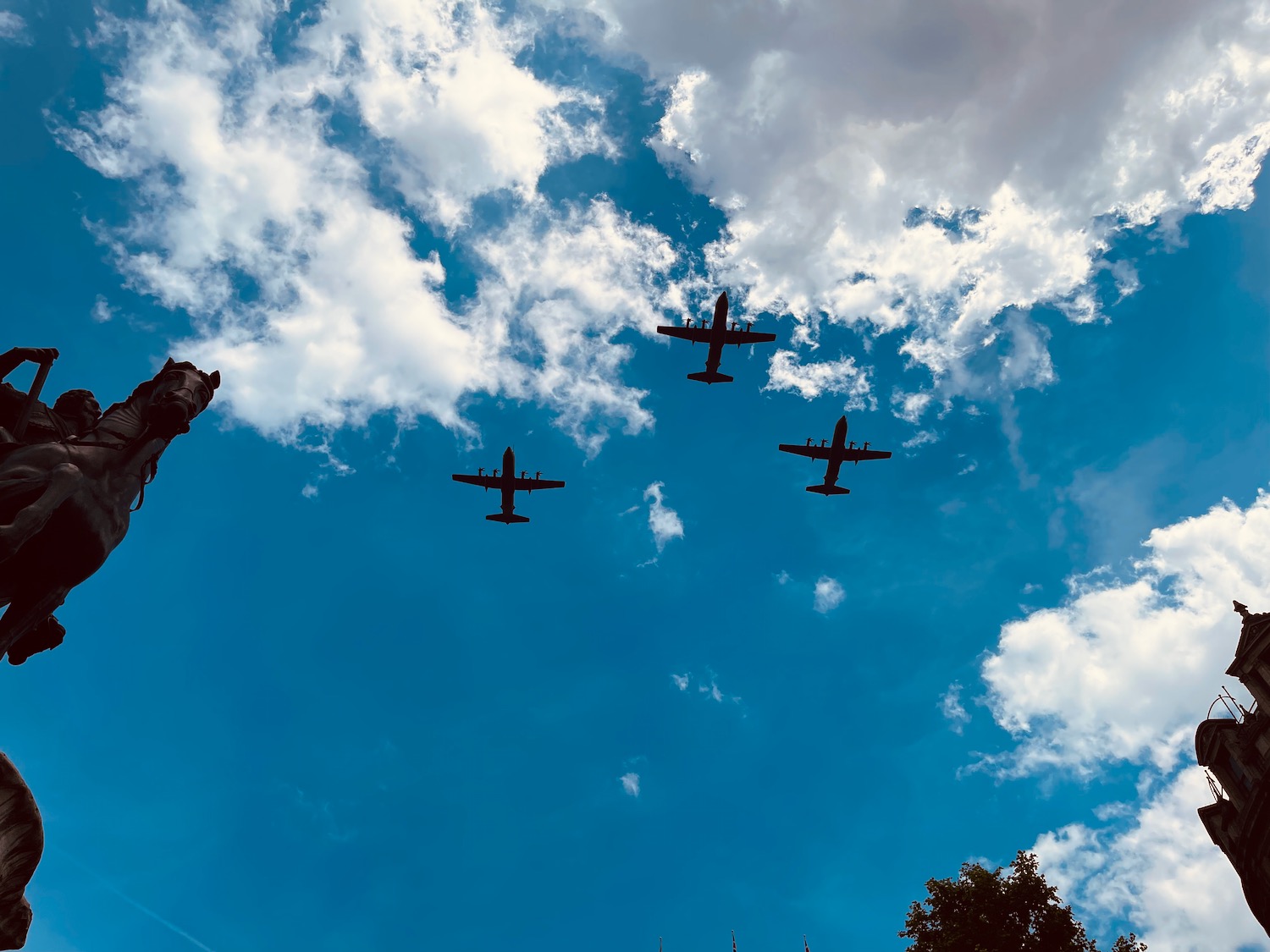 a group of airplanes flying in the sky