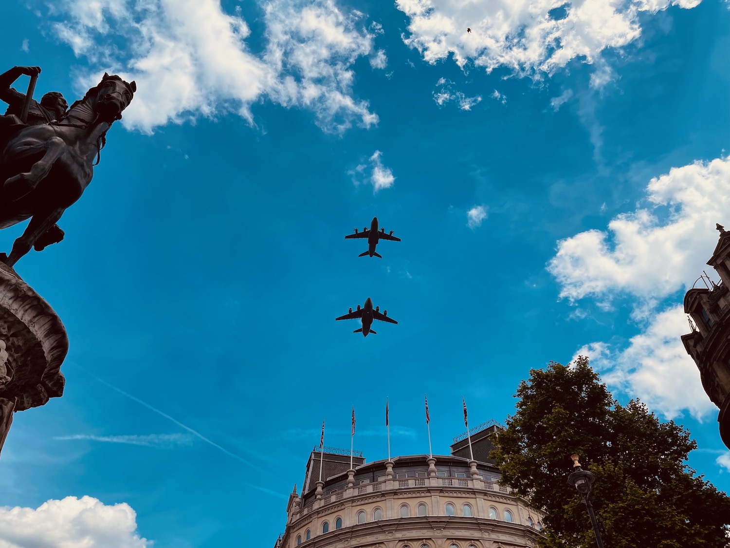 a group of airplanes flying in the sky