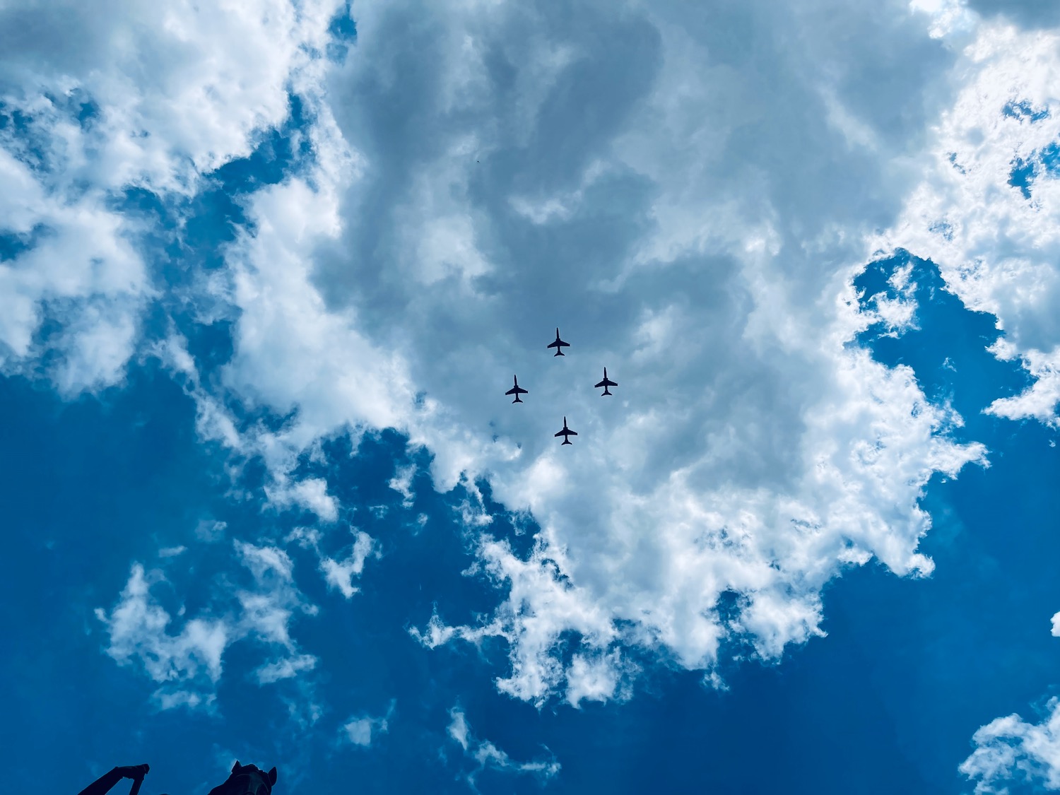 a group of airplanes flying in formation