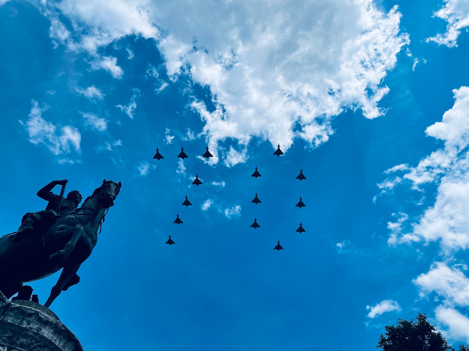 a group of jets flying in the sky