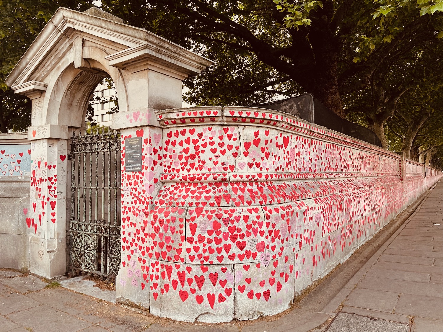 a wall with red hearts on it