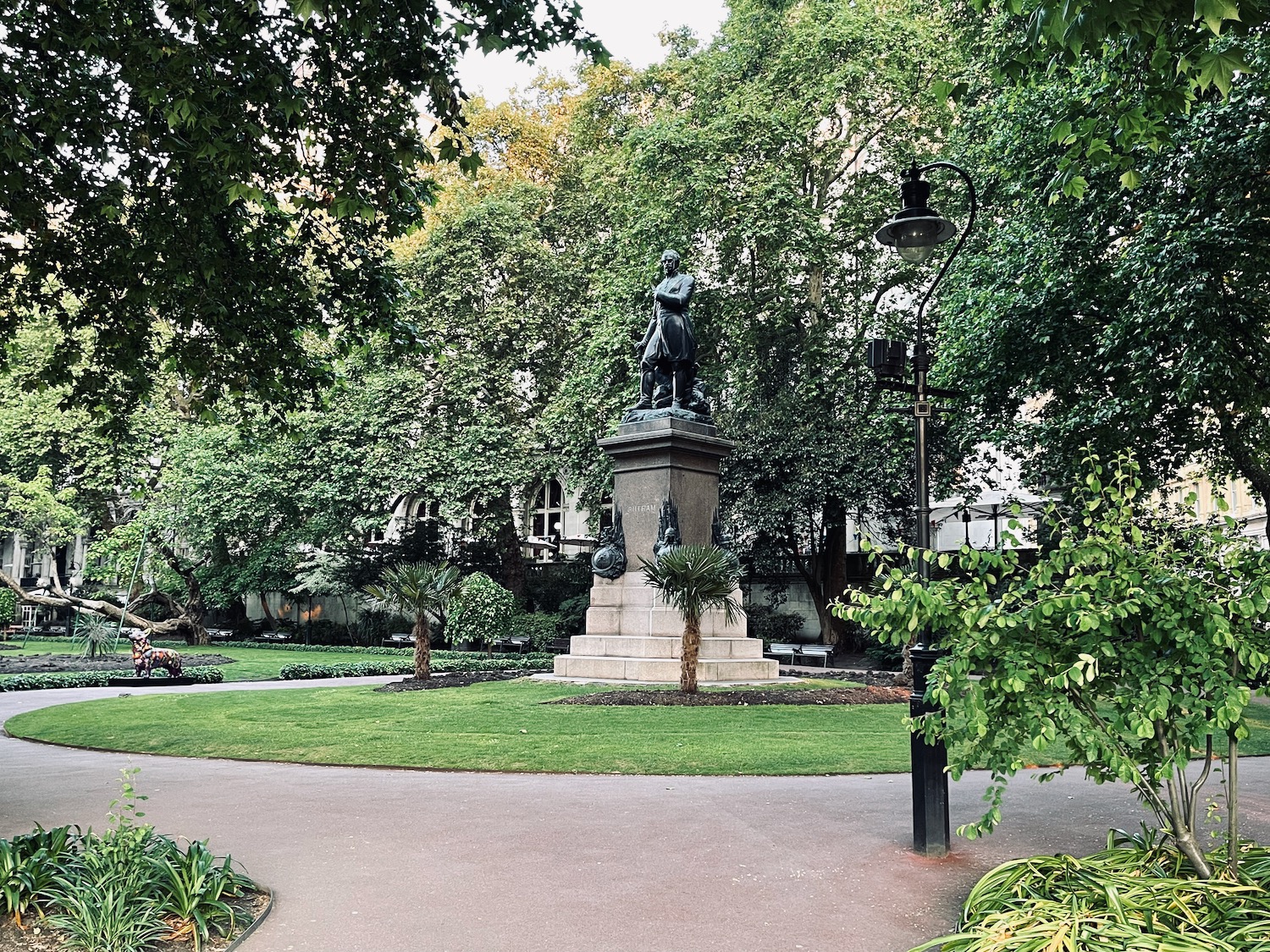 a statue of a man in a park