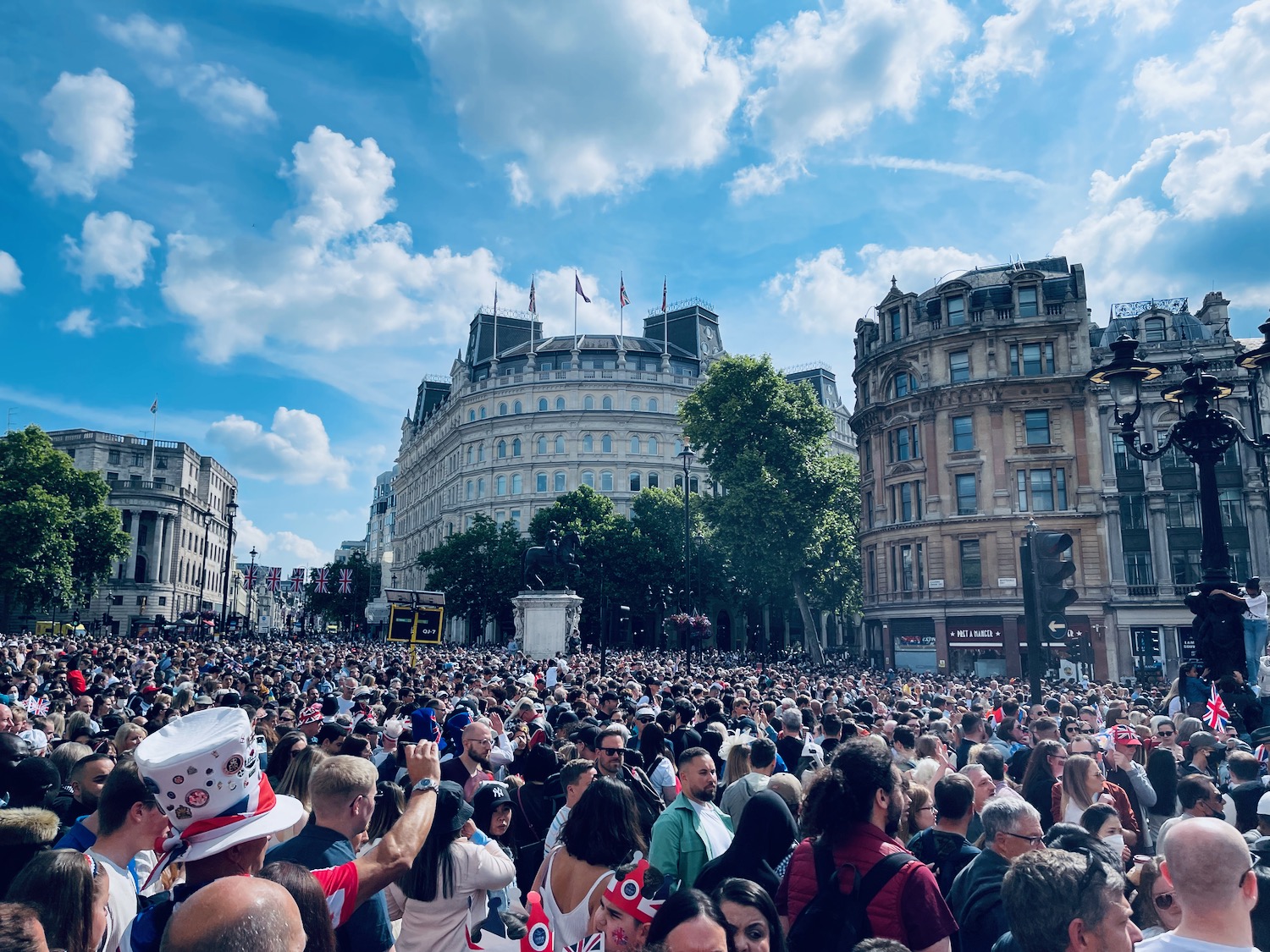 a large crowd of people in a city