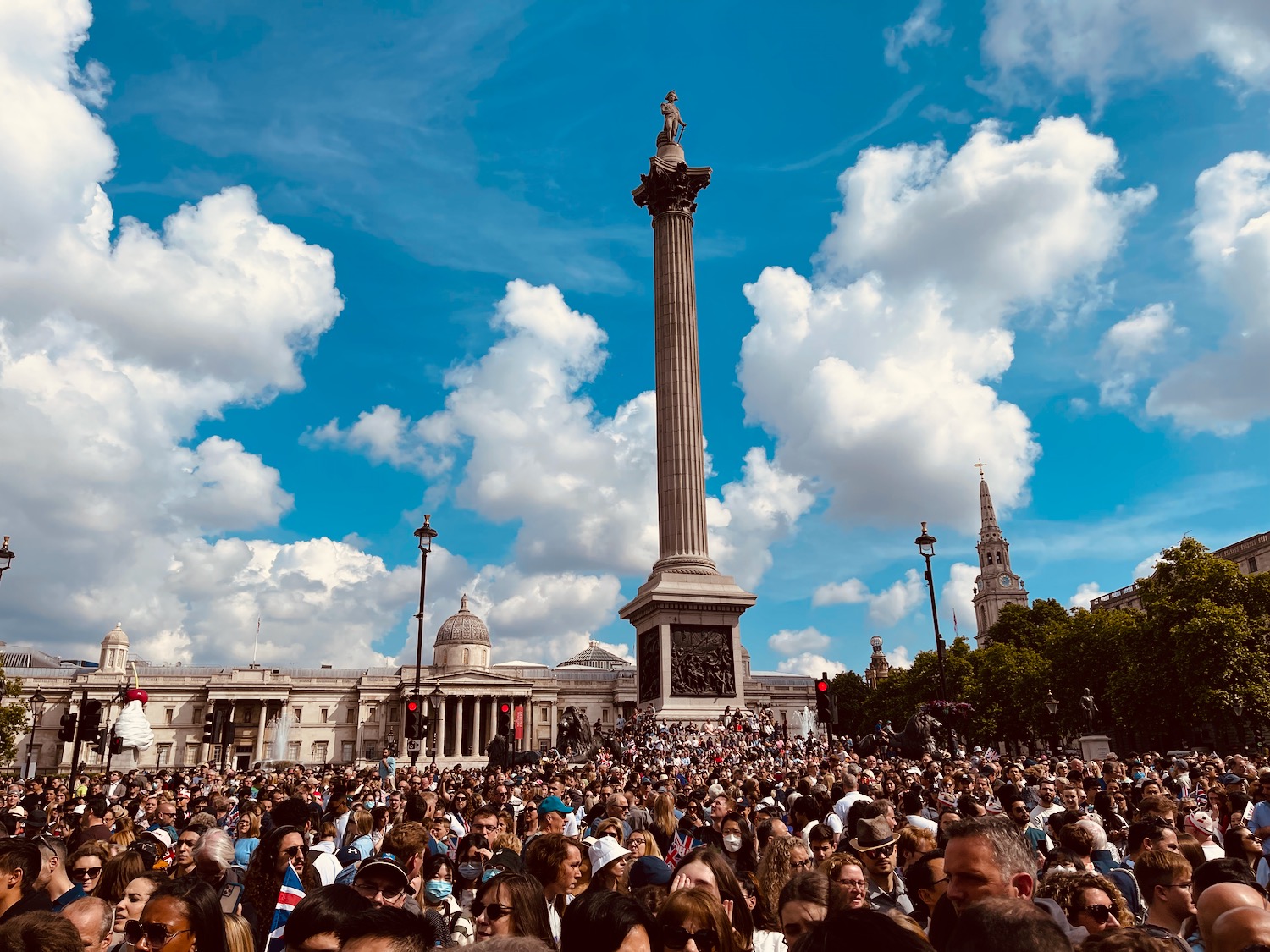 a large crowd of people outside a building