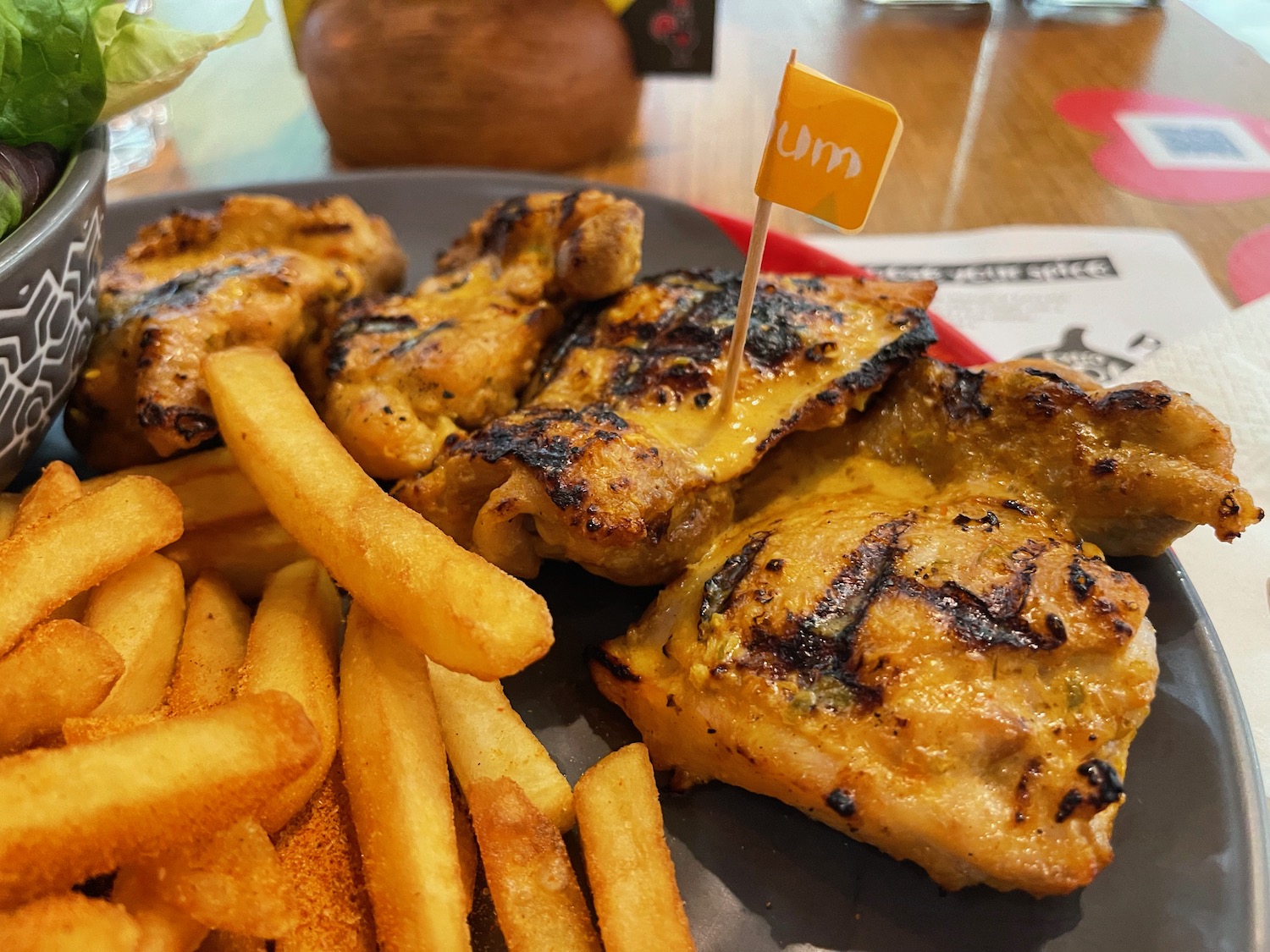 a plate of chicken and fries